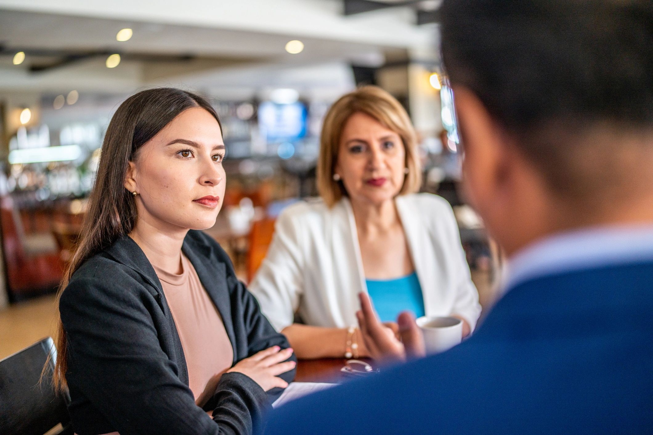 Professionals meeting together in a modern business setting